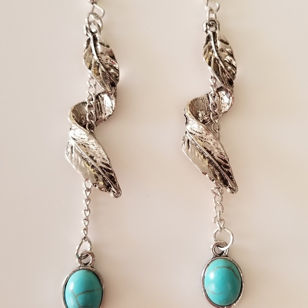 Long dangle and hook earrings.